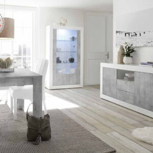 VITRINE 2 PORTES LED (COLLECTION AMINA BLANC/BÉTON) / 17390 Structure en panneau de particules mélaminé coloris blanc et gris béton verni polyester finition brillante. Dimensions : 110x42xH191cm LES + PRODUITS : Design moderne Éclairage LED Qualité de fabrication italienne L'élégance mais également l'originalité s'invitent dans votre intérieur. Avec les meubles de la collection Amina votre décoration ne laissera personne indifférent. Grâce à ses dimensions compactes, la vitrine est un meuble tout indiqué pour équiper votre salon. Elle dispose de 2 portes vitrées qui permettent d'accéder à son contenu, idéales pour la vaisselle et les objets décoratifs. Ce vaisselier reste bien stable année après année.