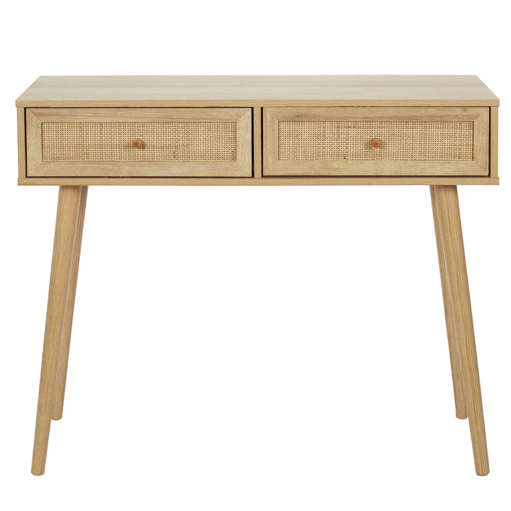 Console BALI / HD5132 Une gamme relaxante qui évoque les vacances et les bords de mer. Son effet bois et ses détails en rotin donneront un côté naturel et paisible à votre intérieur.Structure en panneaux de particules, revêtement papier décor bois. Façades en rotin.Dimensions : 100 x 29 x H81cm.