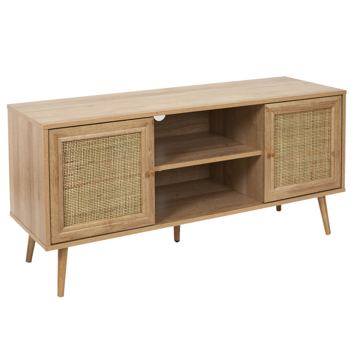 Meuble TV BALI / HD7457 Son effet bois et ses détails en rotin donneront un côté naturel et paisible à votre intérieur.Piétement en eucalyptus.Structure en panneaux de particules, finition aspect bois.Façades en rotin.Dimensions : 115 x 39 x H 56,5 cm.